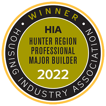 Circular badge that reads WINNER HIA HUNTER REGION PROFESSIONAL MAJOR BUILDER 2022 with HOUSING INDUSTRY ASSOCIATION around the outer edge. The colors are gold, black, and white.