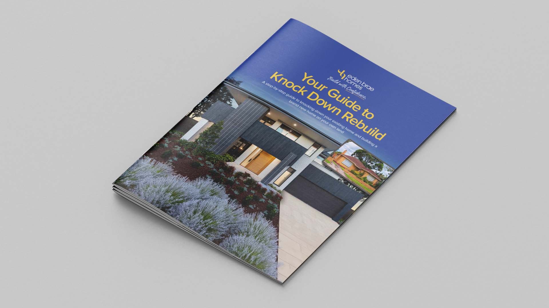 A brochure with a blue cover titled Your Guide to Knock Down Rebuild featuring a modern house with a driveway and landscaped front yard.